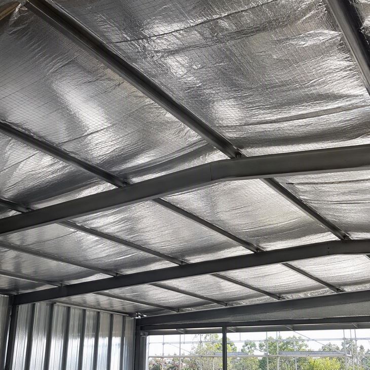 Completed Reflective Vapour Barrier Installation Under Metal Roof
